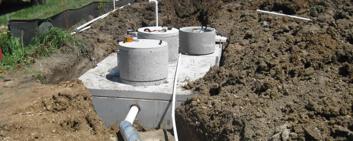 Septic system repair and installation site with tank access ports in Spokane, WA